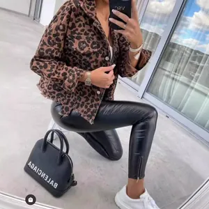 Fashionable street style leopard print long sleeve cropped denim jacket with raw hem details