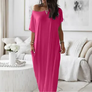 Detailed shot of a bright pink loose-fit short-sleeve maxi dress for casual summer wear