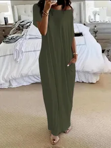 Casual olive green short sleeve maxi dress with side pockets and a loose, comfy fit