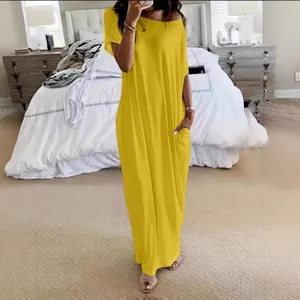 Elegant solid yellow short sleeve maxi dress with pockets for casual summer days