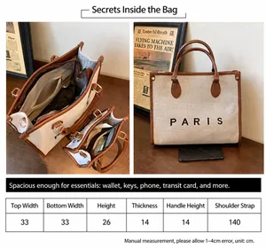 Detailed view of canvas tote bag showing internal pockets and size chart 33x26x14cm