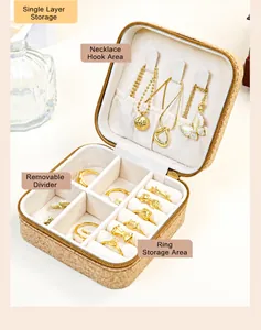 Detailed internal view of travel jewelry organizer with necklace hooks and ring compartments