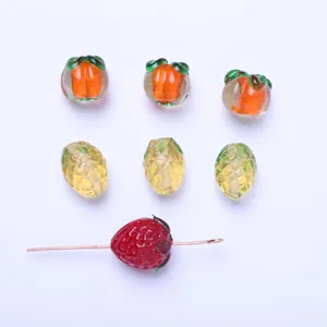 Detailed view of mini fruit-shaped glass beads for DIY jewelry making craft accessories