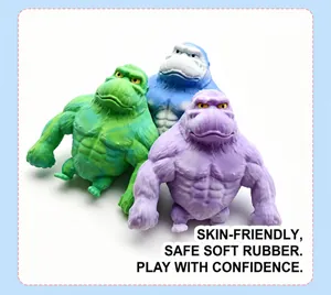 Detailed view of three colorful muscular gorilla stress relief toys in soft rubber