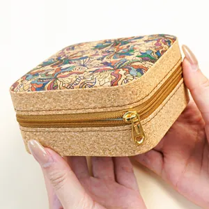 Exotic patterned cork jewelry storage box for rings and earrings with gold zipper