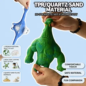 Stretchable green gorilla stress toy filled with sand being pulled by hands for relief