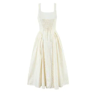 Back view detail of French style yellow gingham maxi dress with lace-up waist
