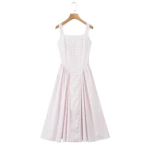 Elegant French style pink gingham dress featuring a square neck and waist-cinching design