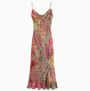 Detail of boho patchwork print backless maxi dress with vibrant paisley patterns