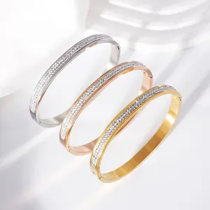 Detail showing three colors of sparkling rhinestone inlaid stainless steel bangles