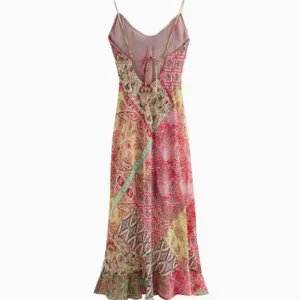 Stylish bohemian floral patchwork print slip dress featuring an open lace-up back design