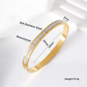 Detailed view of gold stainless steel bangle with measurements and 19.4g weight