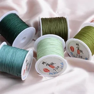 73# jewelry thread spools in green shades for DIY braiding and beading, 0.6mm cord.