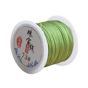 Spool of green 0.6mm 73# DIY jade cord jewelry thread for handmade bracelet weaving