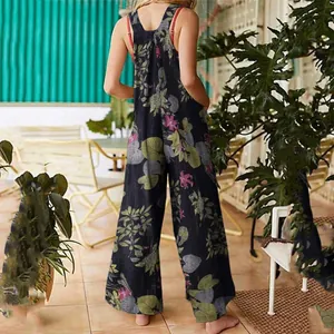Back view of a bohemian floral print jumpsuit with wide-leg design in a garden setting