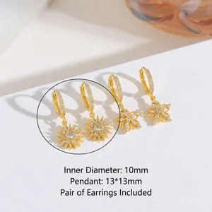 Detailed view of gold plated sunflower hoop earrings with sparkling zircon stones