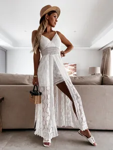 Full-body view showing the intricate lace texture and high-waist split skirt detail