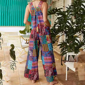 Back view detail of women's boho patchwork print jumpsuit with vibrant ethnic patterns