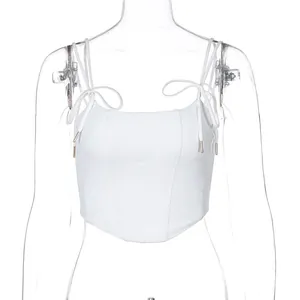 White corset style crop top with adjustable shoulder tie-up straps and slim fit design