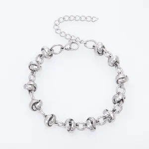 Bracelet gourmette en acier titane argenté unique avec breloques perles nœuds