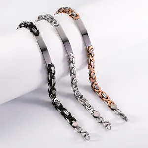 Detailed view of men's Byzantine chain bracelets in silver, gold, and black colors.