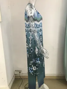 Side view of elegant summer boho floral printed V-neck maxi dress with side slits