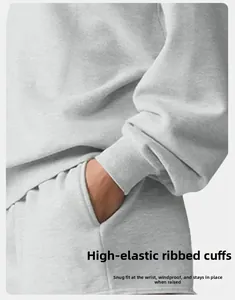 Close-up detail of high-elastic ribbed cuff and side pocket on this grey sport hoodie