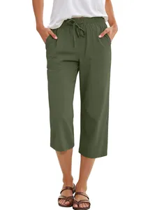 Detail view of olive green cotton linen cropped wide-leg pants with drawstring waist.