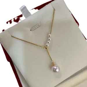 Elegant mermaid tear pearl necklace with silver-plated Y-chain and round pearl pendant.