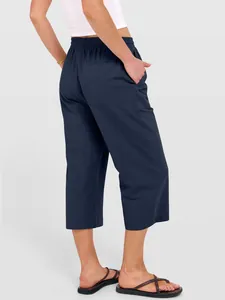Back detail of navy blue wide-leg cotton linen pants with pocket and elastic waist