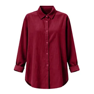 Detailed macro view showing texture of a wine red oversized cotton linen shirt for women
