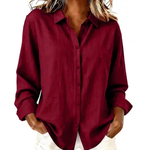 Close-up of a burgundy loose-fit cotton linen long-sleeve shirt with button-down lapel