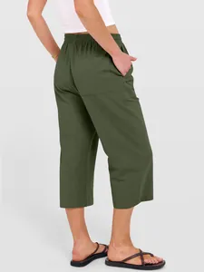 Back view of army green linen wide-leg pants showing rear pocket and elastic waist