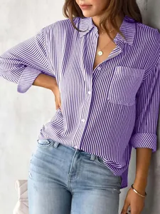 Detail view of casual purple striped long-sleeve shirt with chest pocket and buttons