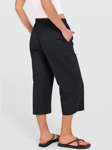 Stylish women's comfortable loose-fit cotton linen cropped pants in solid black color