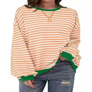 T-shirt casual a maniche lunghe a righe arancio e bianco con girocollo verde a contrasto
