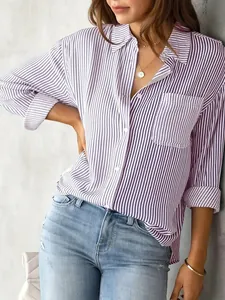 Close-up detail of a purple and white vertical striped loose casual long-sleeved shirt