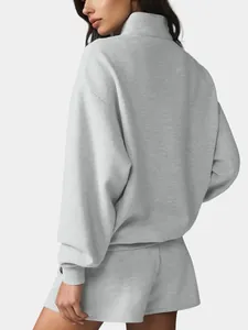 Comfortable gray half-zip yoga sweatshirt and shorts set with a loose fit, back view