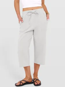 Women's light gray linen-cotton wide-leg pants with drawstring waist shown on model