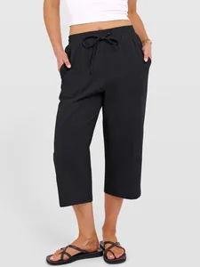 Full front view of black cotton linen wide leg cropped trousers with drawstring elastic waist
