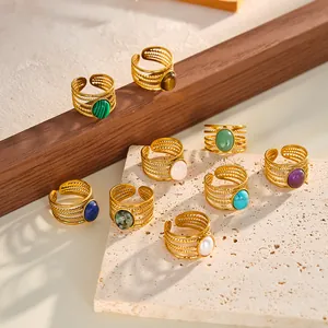 Detailed view of vintage 18k gold-plated stainless steel rings with natural stones