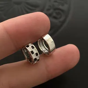 Close-up of S925 sterling silver checkerboard pattern hoop earrings for women