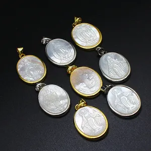 Detailed view of intricate religious figures carved in natural mother-of-pearl shells