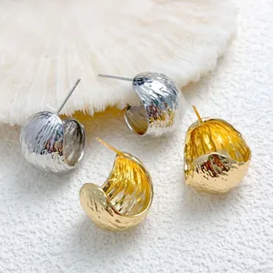 Detailed view of stylish Korean geometric crinkled stud earrings in gold and silver finish