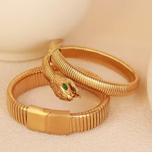 Luxury gold-plated elastic snake bracelet with green zircon eyes for women