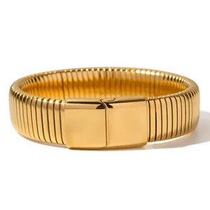 Minimalist gold-toned elastic Tubogas snake-style wrap bracelet with polished clasp