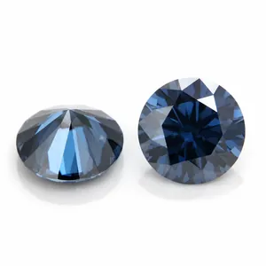 Detailed view of two round-cut sapphire blue moissanite stones with H&A facets