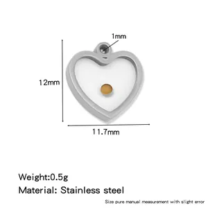 Stainless steel heart pendant with mustard seed, 12mm x 11.7mm size guide.