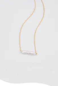 Close-up of a minimalist bar-shaped baroque pearl necklace in S925 sterling silver.