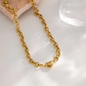Elegant gold heart pendant necklace with chunky stainless steel Cuban chain for women